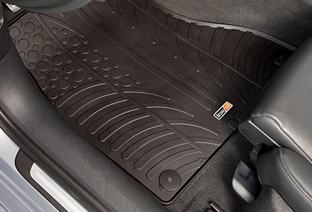 Vehicle specific rubber mats
